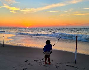 Cooper hauling one in, Cape May